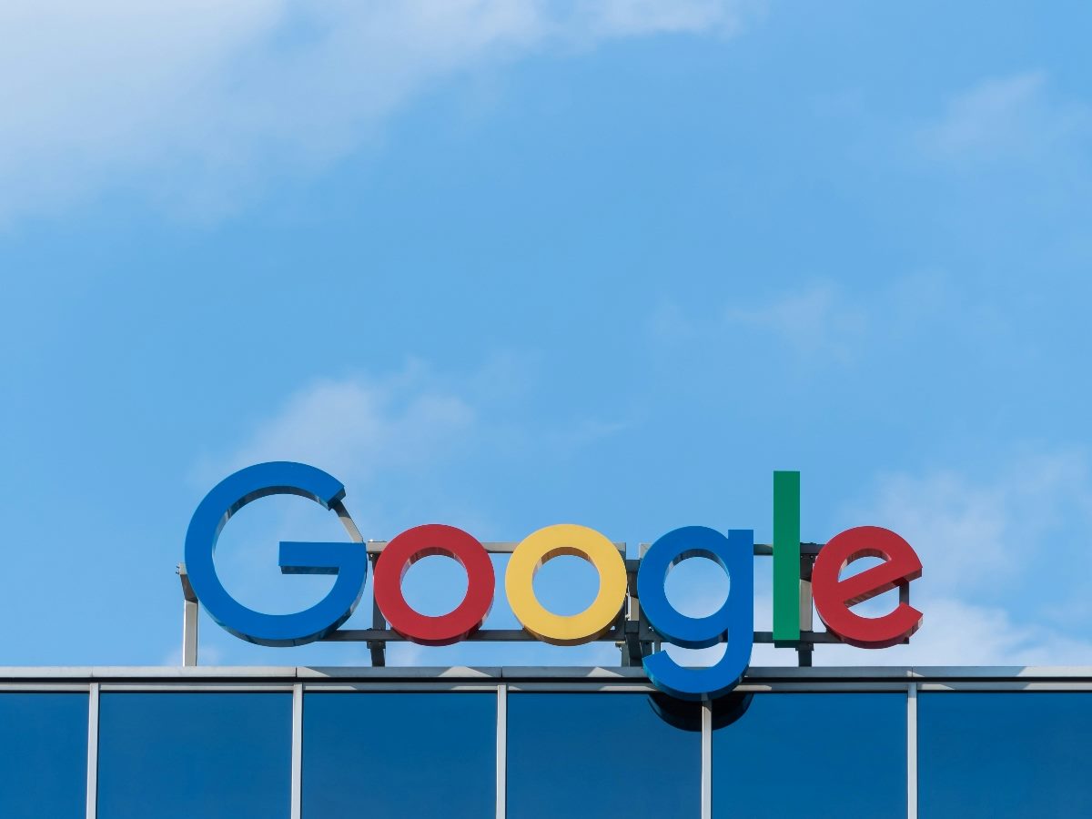 Google sign on top of a building.