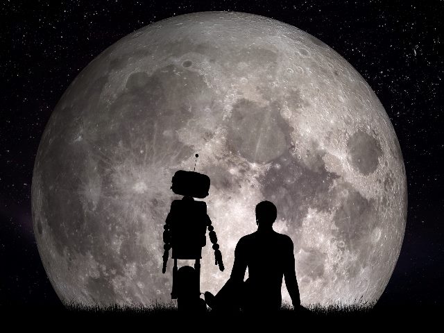 Man and his robot friend looking at moon in black and white. Shot is from behind the robot (standing) and man (sitting).