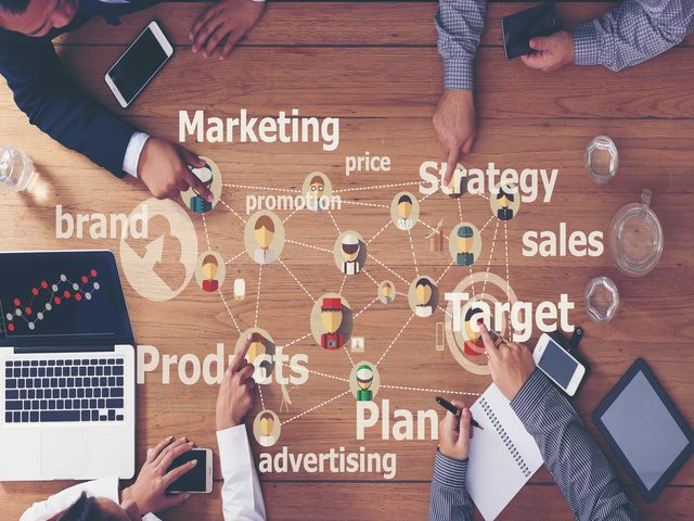 A web illustration of a marketing strategy, including words like "brand," "sales" and "products."
