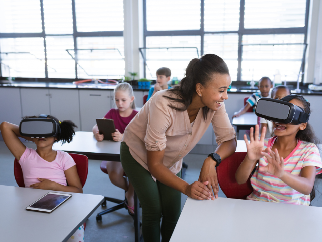 Kids in classroom with VR headsets