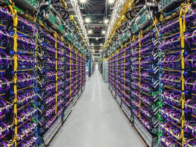 A row of Cloud TPU v5p AI accelerator supercomputers in a Google data center in piece about release of Google's Gemini.