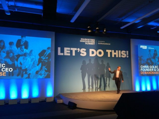 Demandbase CEO Chris Golec on stage at a recent technology conference.