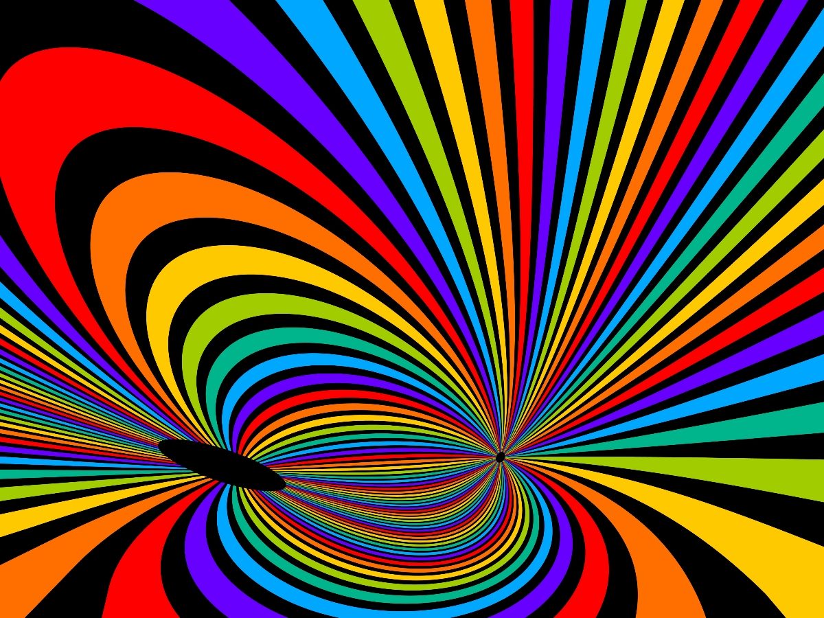 Colorful abstract image featuring a hypnotic swirl of rainbow-colored stripes converging into a central black void on the left and a sharp focal point on the right, creating a dynamic tunnel effect.