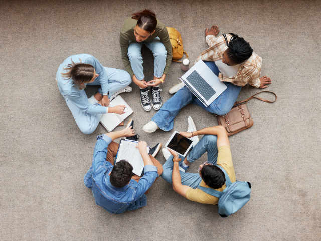 Students sitting in a circle 