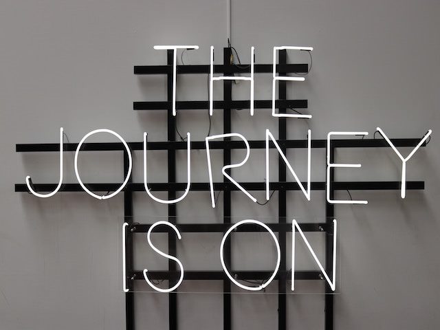 Led light reading "The Journey Is On"