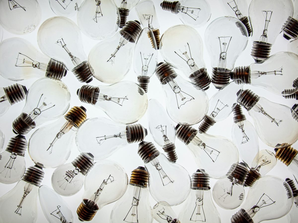collection of incandescent lightbulbs against a white background