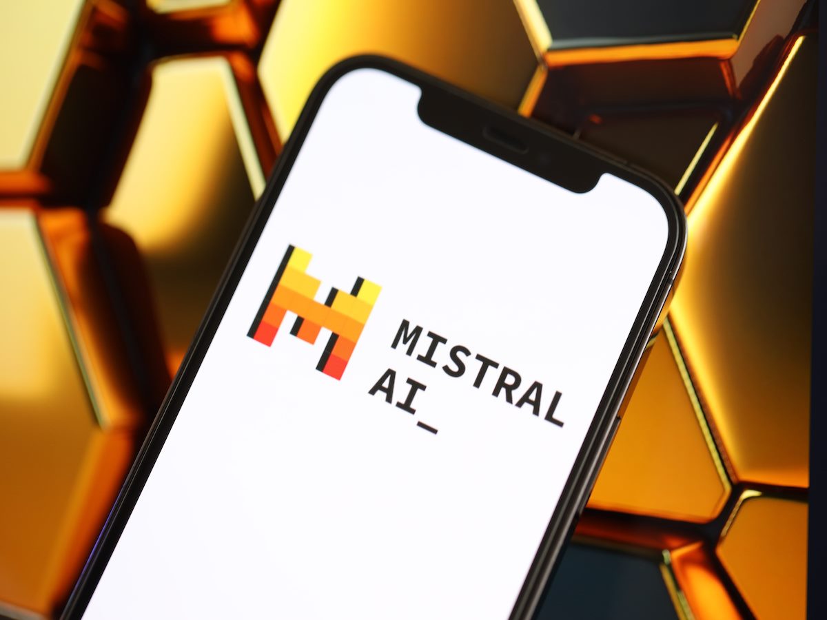 Mistral AI logo on iPhone display screen