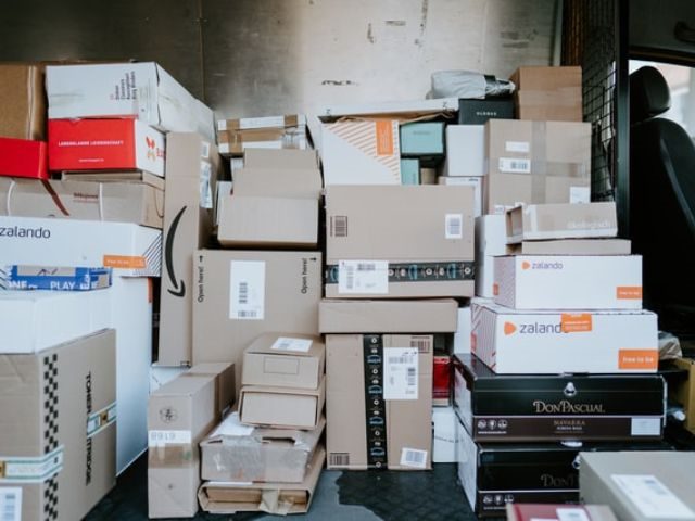 A delivery truck filled with packages