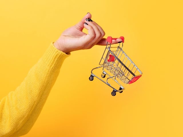 Woman holding shopping cart