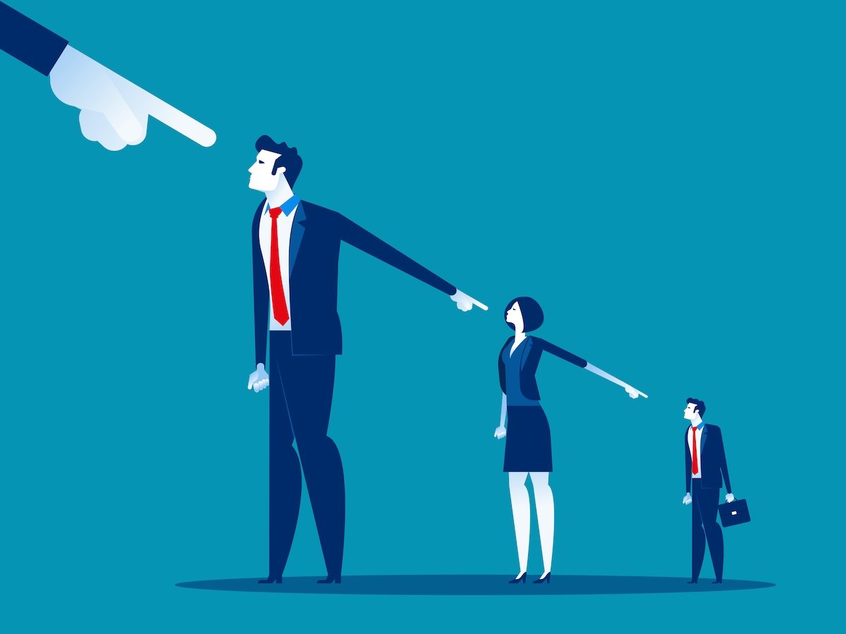 business people pointing the finger at each other