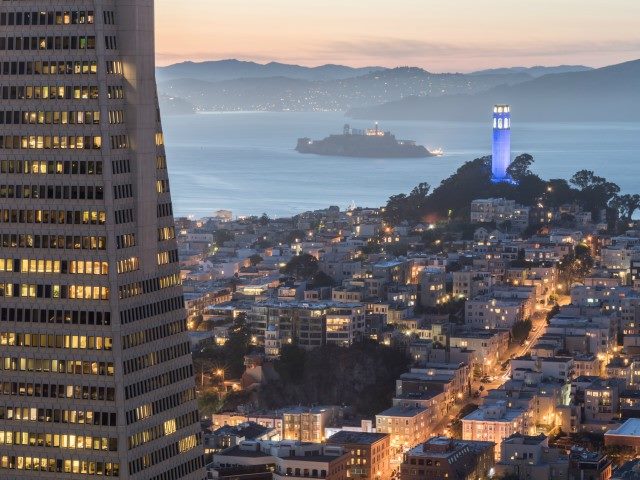 Dusk over Telegraph Hill, Alcatraz Island and San Francisco Bay from the Financial District. 