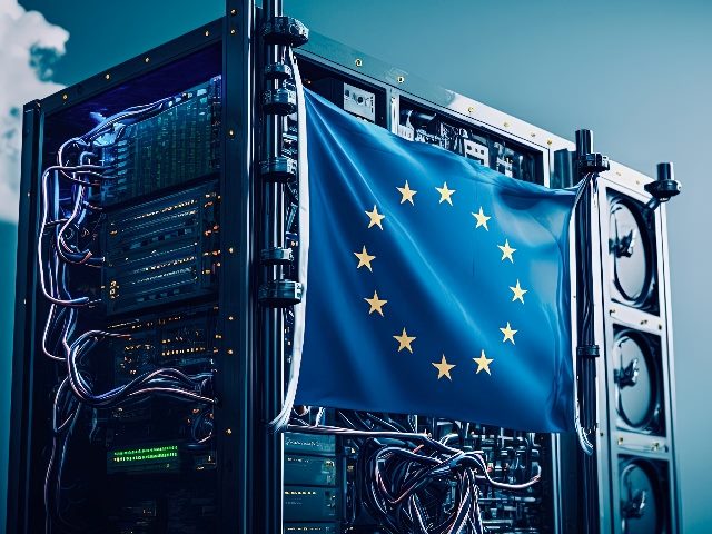A big block of computer hardware draped in an EU blue flag with yellow stars in piece concerning EU AI Act and other AI legislation. 