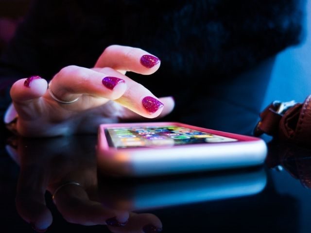 Person using a smartphone.