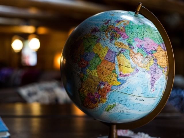 A globe sitting on a desk