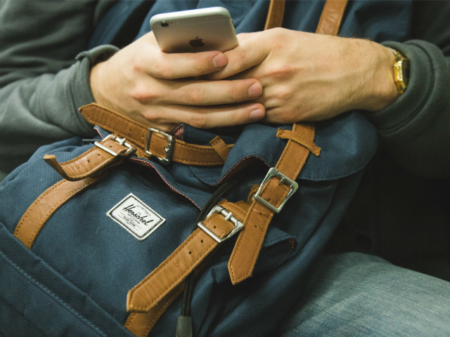 man with mobile device