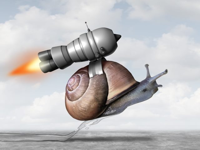 A rocket carries a snail, allowing it to travel further, serving as a representation of increased productivity