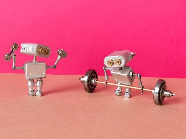 Robot weightlifter and robotics athlete train with heavy barbell and light fitness dumbbells against a pink and orange background, indicating the power of AI in SEO planning. 