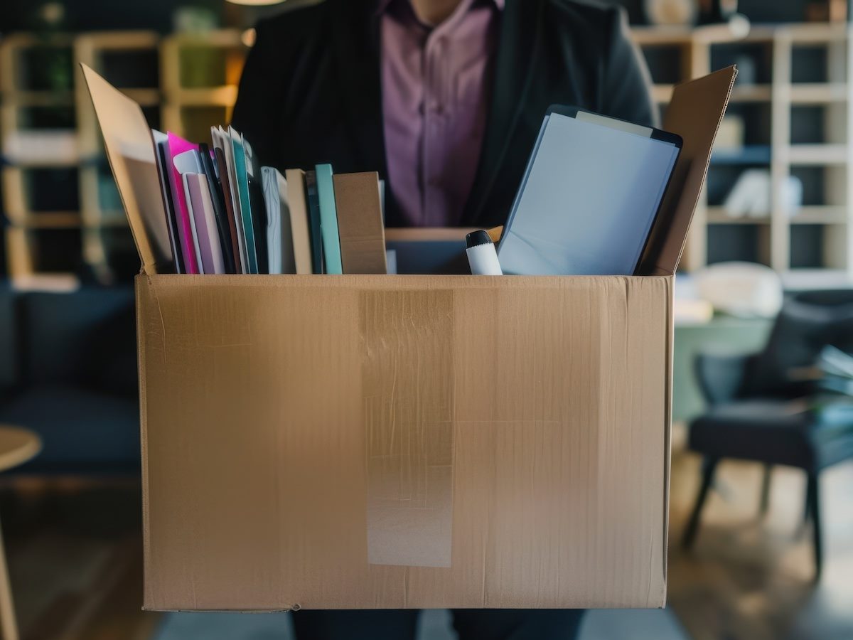 Employee with Moving Box full of personal belongings